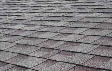 Radipole tiles for shallow pitch roofing
